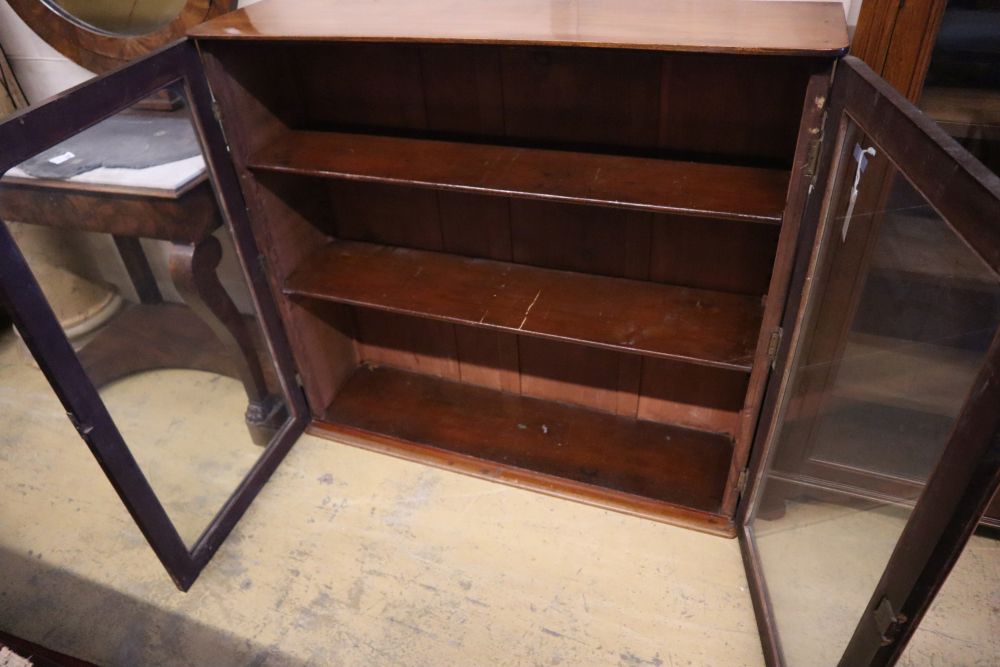 A Victorian mahogany two door bookcase, width 115cm, depth 30cm, height 104cm